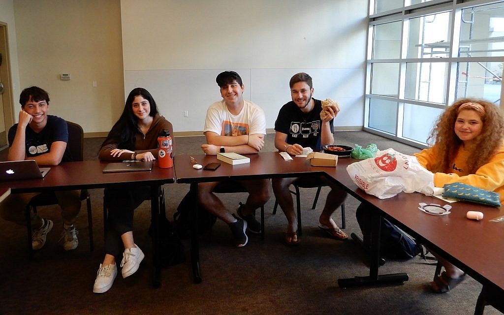 The high school class of Beged Kefet, from left to right, Tomer Sadan, Danielle Vansover, Nadav Avital, Ben Cohen, and Shahar Segal, at the Palo Alto JCC in California on September 4, 2019. (Melanie Lidman/Times of Israel)
