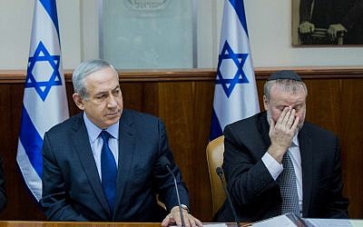 Prime Minister Binyamin Netanyahu (L) and then-cabinet secretary Avichai Mandelblit at the weekly government conference, at the Prime Minister's Office in Jerusalem, on December 13, 2015. (Yonatan Sindel/Flash90)