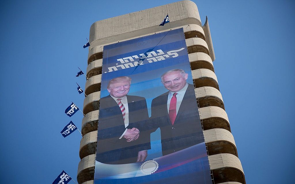 A large billboard depicting US President Donald Trump and PM Benjamin Netanyahu, as part of the Likud election campaign, at the Likud headquarters in Tel Aviv, September 4, 2019 (Miriam Alster/Flash90)