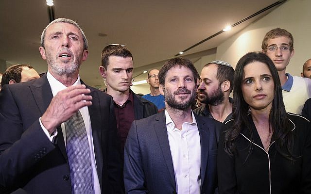 Then-Yamina party chair Ayelet Shaked, right, with party members Bezalel Smotrich, center, and Rafi Peretz, left, at Yamina's campaign headquarters on election night in Ramat Gan, September 17, 2019. (Flash90)