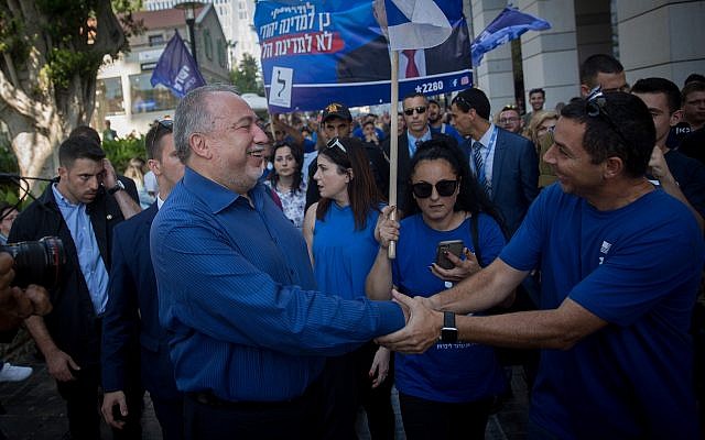 Yisrael Beytenu leader Avigdor Liberman tours the Sarona Market shopping center in Tel Aviv on election day, September 17, 2019. (Miriam Alster/Flash90)