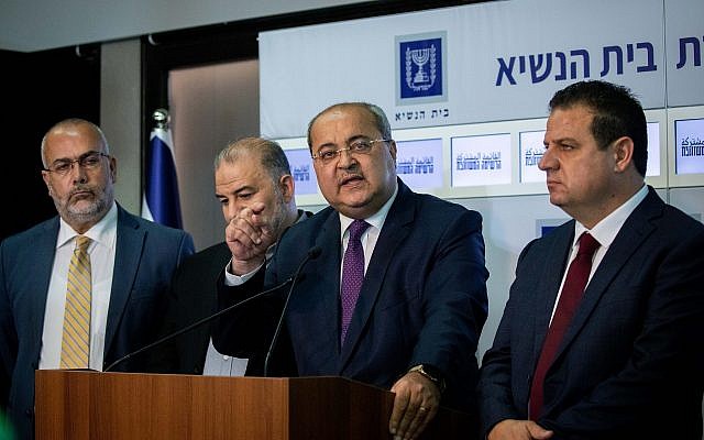 MK Ahamd Tibi, center, together with members of the Joint List hold a press conference after meeting with President Reuven Rivlin at the President's Residence in Jerusalem on September 22, 2019. (Yonatan Sindel/Flash90)