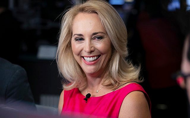 Former CIA operative Valerie Plame is interviewed on the floor of the New York Stock Exchange, October 22, 2018. (AP Photo/Richard Drew, File)