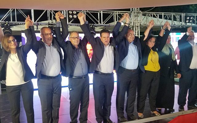 Joint List candidates celebrating the results of Channel 13's exit poll which initially projected the party would win 13 seats in the Knesset. (Adam Rasgon/Times of Israel)