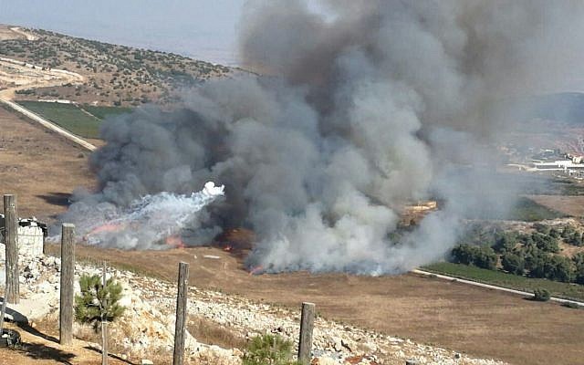 Smoke rises near the community of Avivim following an anti-tank missile attack from Lebanon on September 1, 2019. (Courtesy)