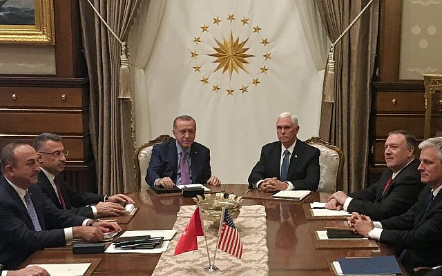 Turkish President Recep Tayyip Erdogan (C-L) and US Vice President Mike Pence (C-R), joined by Secretary of State Mike Pompeo (4R), Turkish Vice President Fuat Oktay (4L), Turkish Foreign Minister Mevlut Cavusoglu (3L) and senior aides, meet at the presidential complex in Ankara, Turkey, on October 17, 2019. (Shaun TANDON / POOL / AFP)