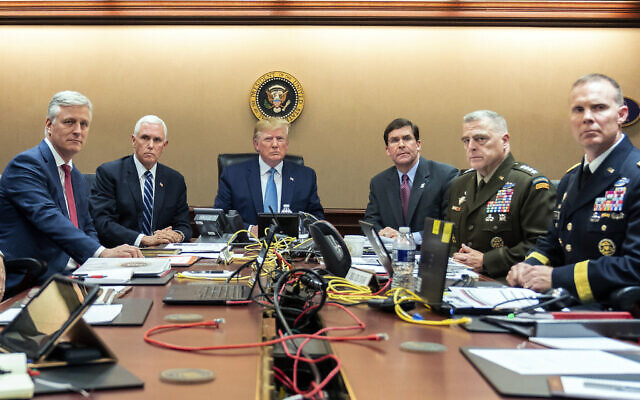 In this photo provided by the White House, US President Donald Trump is joined by from left, national security adviser Robert O'Brien, Vice President Mike Pence, Defense Secretary mark Esper, Joint Chiefs Chairman Gen. Mark Milley and  Brig. Gen. Marcus Evans, Deputy Director for Special Operations on the Joint Staff, October 26, 2019, in the Situation Room of the White House in Washington, as they monitor developments in the US Special Operations forces raid that took out Islamic State leader Abu Bakr al-Baghdadi. (Shealah Craighead/The White House via AP)