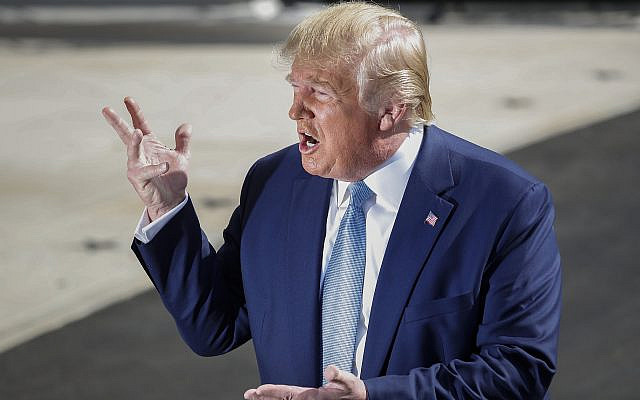 US President Donald Trump gestures while speaking to the media on the South Lawn of the White House in Washington, October 4, 2019. (Pablo Martinez Monsivais/AP)