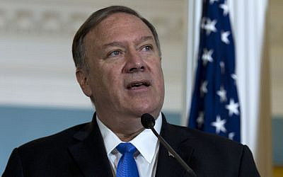 Secretary of State Mike Pompeo accompanied by Colombian Foreign Minister Carlos Holmes Trujillo, speaks to reporters after a bilateral meeting at the Department of State in Washington, Wednesday, Oct. 9, 2019. (AP Photo/Jose Luis Magana)