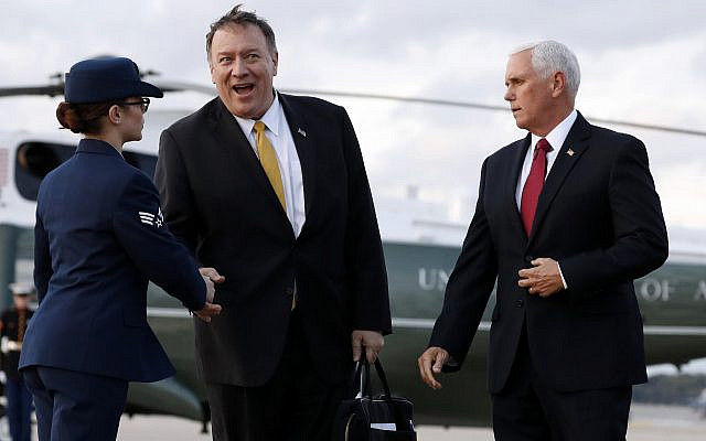 Vice President Mike Pence and Secretary of State Mike Pompeo arrive at Andrews Air Force Base, Md., Wednesday, Oct. 16, 2019, as they depart en route to Turkey. (AP Photo/Jacquelyn Martin)