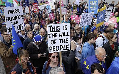 Anti-Brexit remain in the European Union supporters take part in a "People's Vote" protest march calling for another referendum on Britain's EU membership, in London, Oct. 19, 2019 (AP Photo/Matt Dunham)