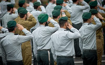 Soldiers of the IDF Intelligence Unit attend a ceremony for the appointment of the new chief of Intelligence at Glilot military base, near Tel Aviv, March 28, 2018.  (Miriam Alster/Flash90)