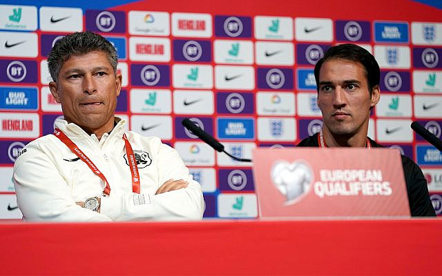 Bulgaria's manager Krasimir Balakov, left, with captain Ivelin Popov, right, attenda a press conference at Wembley Stadium, London, Sept. 6, 2019. (John Walton/PA via AP)