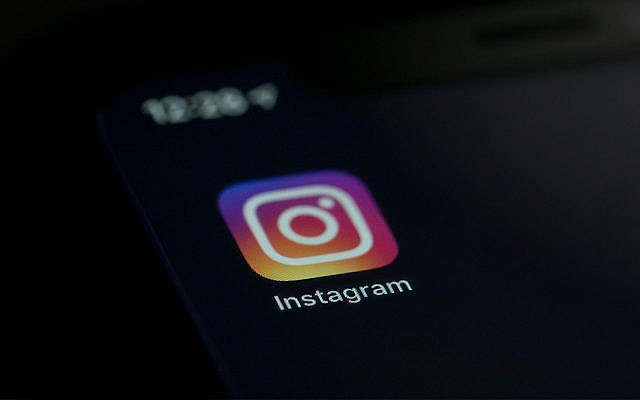 Illustrative: the Instagram app icon on the screen of a mobile device in New York, August 23, 2019. (AP Photo/Jenny Kane)
