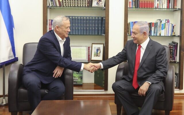 Blue and White party leader Benny Gantz (L) and Prime Minister Benjamin Netanyahu meet at IDF headquarters in Tel Aviv, on October 27, 2019. (Elad Malka)