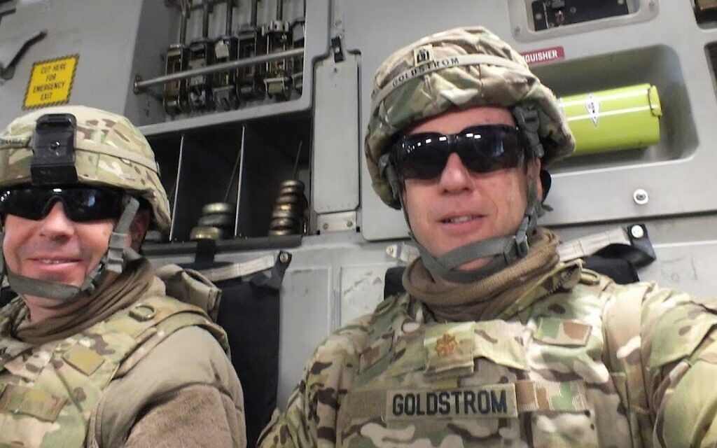 Goldstrom (right) with his chaplain assistant in Afghanistan, Sgt David Teakell, while riding to visit military personnel at other bases and outposts in 2013. (Courtesy of Goldstrom via JTA)