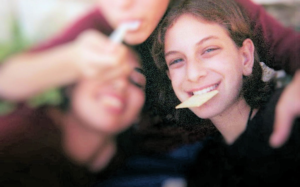 Our daughter, Malki Roth, with her friends, in a photograph found in a disposable camera, after Malki was killed by the bomb set by Ahlam Tamimi at the Sbarro's pizzeria in Jerusalem, on August 9, 2001. (courtesy)