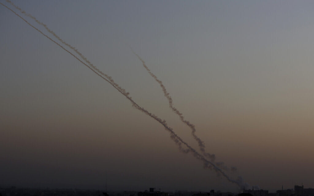 Illustrative: Rockets are launched from the Gaza Strip towards Israel, November 13, 2019. (AP/ Hatem Moussa)