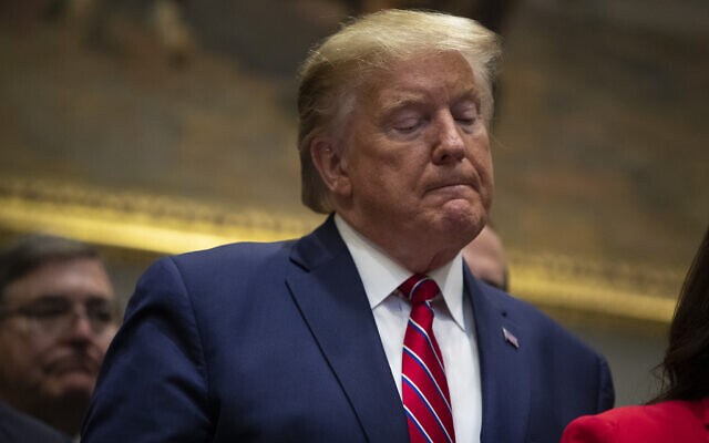 President Donald Trump pauses during an event on healthcare prices in the Roosevelt Room of the White House, Friday, Nov. 15, 2019, in Washington. (AP Photo/ Evan Vucci)