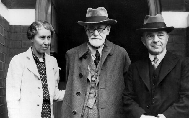 Psychoanalyst Sigmund Freud, center, poses with his daughter Mathilde, left, and Dr. Ernest Jones on his arrival at his Hampstead home in London, England, on June 6, 1938 (AP Photo)