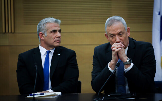 Blue and White party chairman Benny Gantz (R) and No. 2 Yair Lapid at a faction meeting in the Knesset on November 18, 2019. (Hadas Parush/Flash90)