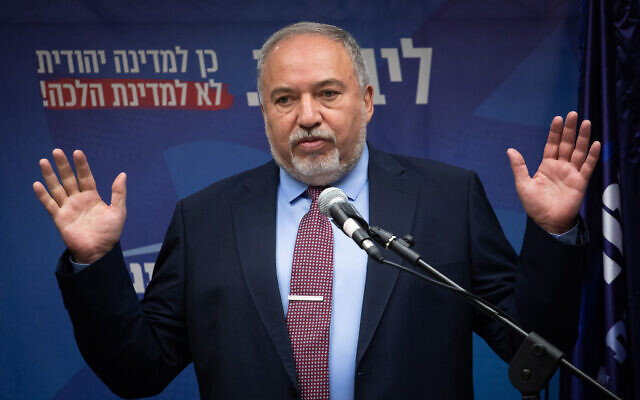 Head of the Israel Beyteinu party Avigdor Liberman speaks with the media during a faction meeting in the Knesset on November 25, 2019. (Hadas Parush/Flash90)