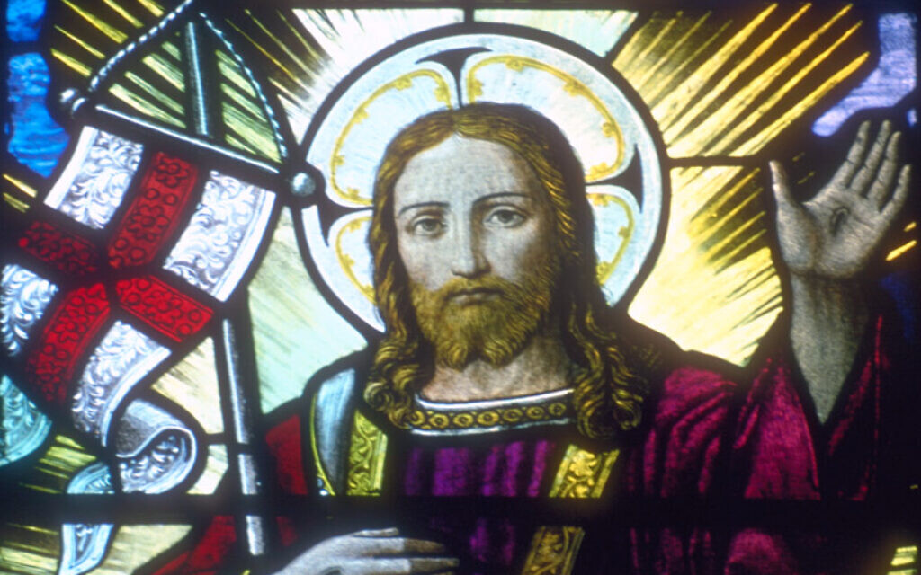 Jesus Christ supporting an English flag and staff in the crook of his right arm depicted in a stained glass window in Rochester Cathedral, Kent. (Wikimedia commons/CC BY-SA 3.0/Dlloyd)