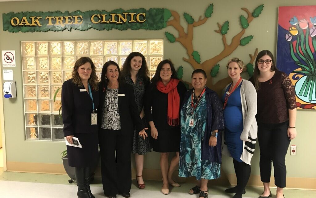 Then-Canadian justice minister Jody Wilson Raybould, center, visits the Oak Tree Clinic just ahead of World AIDS Day in 2017. She is pictured here with Dr. Neora Pick, second from left, and staff. (Courtesy)