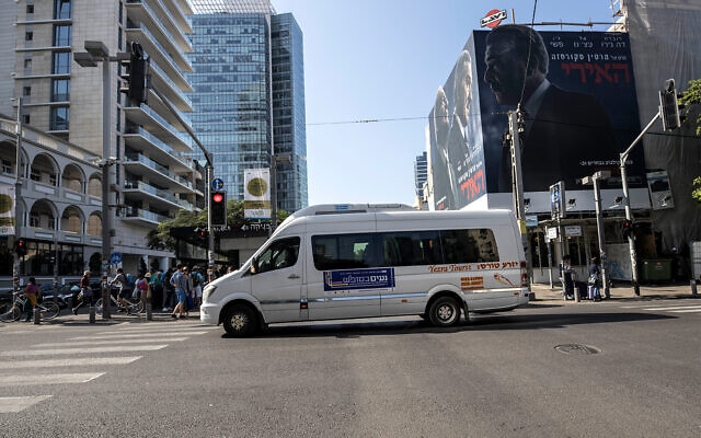 A public bus operated on Shabbat drives through Tel Aviv, November 23, 2019. (AP Photo/Tsafrir Abayov)