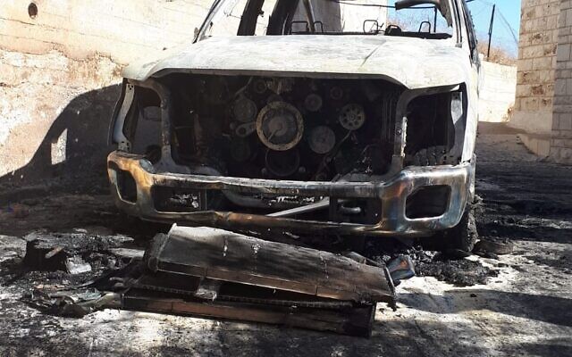 A car found torched in the West Bank village of Taybeh, November 29, 2019. (Taybeh council)
