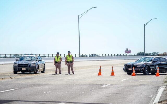 Florida state troopers block traffic over the Bayou Grande Bridge leading to the Pensacola Naval Air Station following a shooting on December 6, 2019, in Pensacola, Florida. (Josh Brasted/Getty Images/AFP)