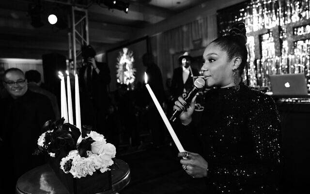 Tiffany Haddish had a candle lighting ceremony at her bat-mitzvah held at the SLS Hotel in Beverly Hills, California, December 3, 2019 . (Emma McIntyre/Getty Images for Netflix via JTA)