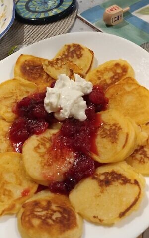 Cassola, or ricotta pancakes, are a traditional Hanukkah food brought to Rome by Sephardic Jews expelled from southern Italy in 1492. (L.C. Arena)
