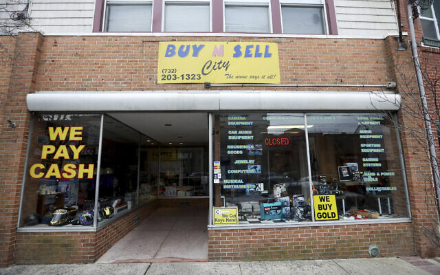 The family-owned Buy n Sell pawnshop searched by the FBI over the weekend is seen in Keyport, New Jersey, December 15, 2019. (Ed Murray/NJ Advance Media via AP)