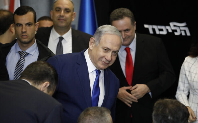 Prime Minister Benjamin Netanyahu arrives to deliver a statement at Airport City in Lod Israel, Friday, Dec. 27, 2019. Netanyahu shored up his base with a landslide Likud leadership victory announced early Friday. (AP Photo/Ariel Schalit)