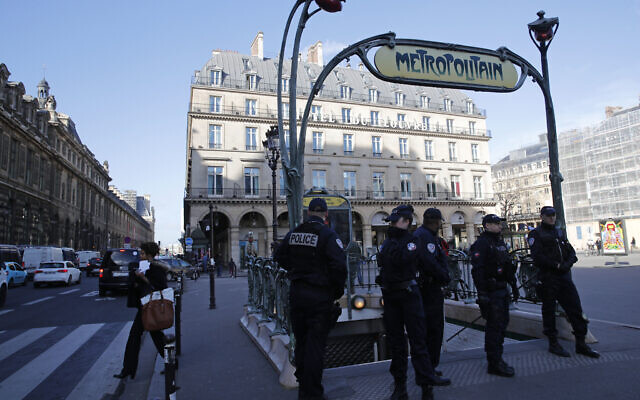 Illustrative: Police officers stand on patrol at a Metro station outside the Louvre museum in Paris, February 3, 2017. (AP Photo/Christophe Ena)