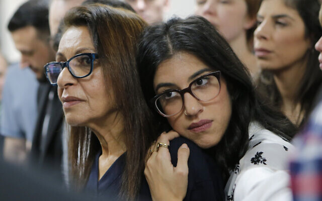 US Israeli backpacker Naama Issachar's mother Yaffa Issachar, left, and sister Liad Goldberg wait for Issachar's appeal hearing in a courtroom in Moscow, Russia, December 19, 2019. (Alexander Zemlianichenko Jr./AP)