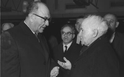 Prime Minister Levi Eshkol (L) and David Ben-Gurion at Lydda Airport before the latter's departure to England for Winston Churchill's funeral, January 1965. (GPO)