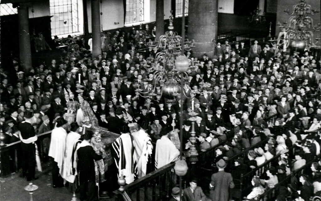 Famous photograph of services at the Portuguese Synagogue in Amsterdam on May 9, 1945, with Holocaust survivors in attendance (public domain)