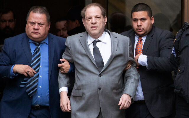 Harvey Weinstein, center, leaves court following a bail hearing, December 6, 2019 in New York. (AP Photo/Mark Lennihan)