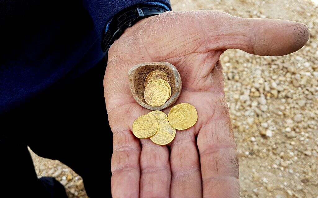 Five ancient gold coins from the Earlier Islamic Period 7th-9th centuries CE, found at a dig in Yavne, central Israel, December 2019. (Liat Nadav-Ziv/Israel Antiquities Authority)