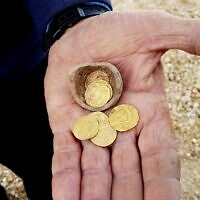 Five ancient gold coins from the Earlier Islamic Period 7th-9th centuries CE, found at a dig in Yavne, central Israel, December 2019. (Liat Nadav-Ziv/Israel Antiquities Authority)