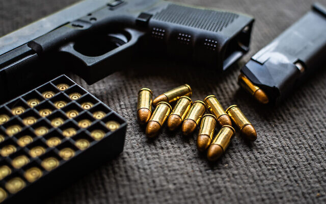 Illustrative: A handgun and bullets (Somboon Kaeoboonsong; iStock by Getty Images)