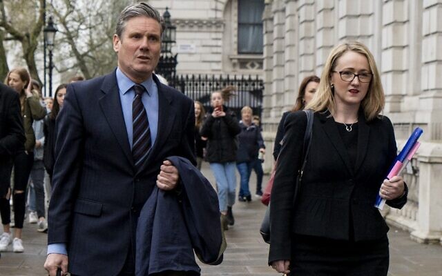 Keir Starmer, left, and Rebecca Long-Bailey of the UK Labour Party arrive at the cabinet office for Brexit talks in London, April 9, 2019. (Niklas Halle'n/AFP)