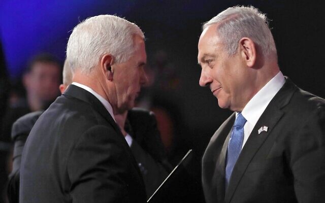 US Vice President Mike Pence (L) greets Prime Minister Benjamin Netanyahu during the Fifth World Holocaust Forum at the Yad Vashem Holocaust memorial museum in Jerusalem on January 23, 2020. (Ronen Zvulun/Pool/AFP)