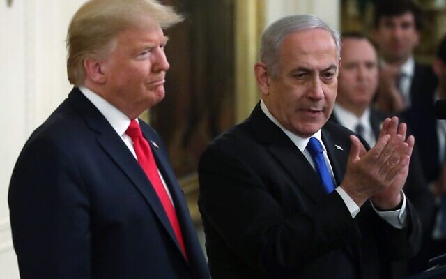 US President Donald Trump and Prime Minister Benjamin Netanyahu (R) attend a press conference in the East Room of the White House on January 28, 2020. (Alex Wong/Getty Images/AFP)
