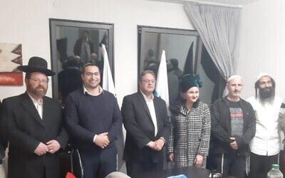 Otzma Yehudit candidates (From L-R) Tiran Zeituni, Meir Ben Hayun, Adva Biton, chairman Itamar Ben Gvir, Itshak Waserlauf and Yehuda Epstein pose for a photo after the party announces its slate from January 5, 2019. (Courtesy)