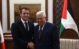 French President Emmanuel Macron (L) and Palestinian Authority President Mahmoud Abbas meeting at the PA presidential headquarters in Ramallah on January 22, 2020. (Wafa)