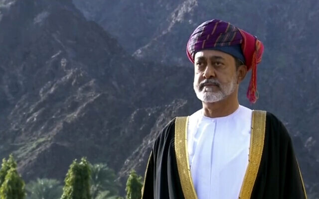 This image made from video shows Oman's new sultan Haitham bin Tariq Al Said, taking part in a cannon-fire salute outside the Royal Family Council in Muscat, Oman, January 11, 2020. (Oman TV via AP)