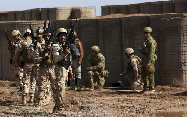 Illustrative: Coalition forces train Iraqi soldiers during a military exercise at Camp Taji, north of Baghdad, Iraq, March 20, 2017. (AP Photo/Hadi Mizban)